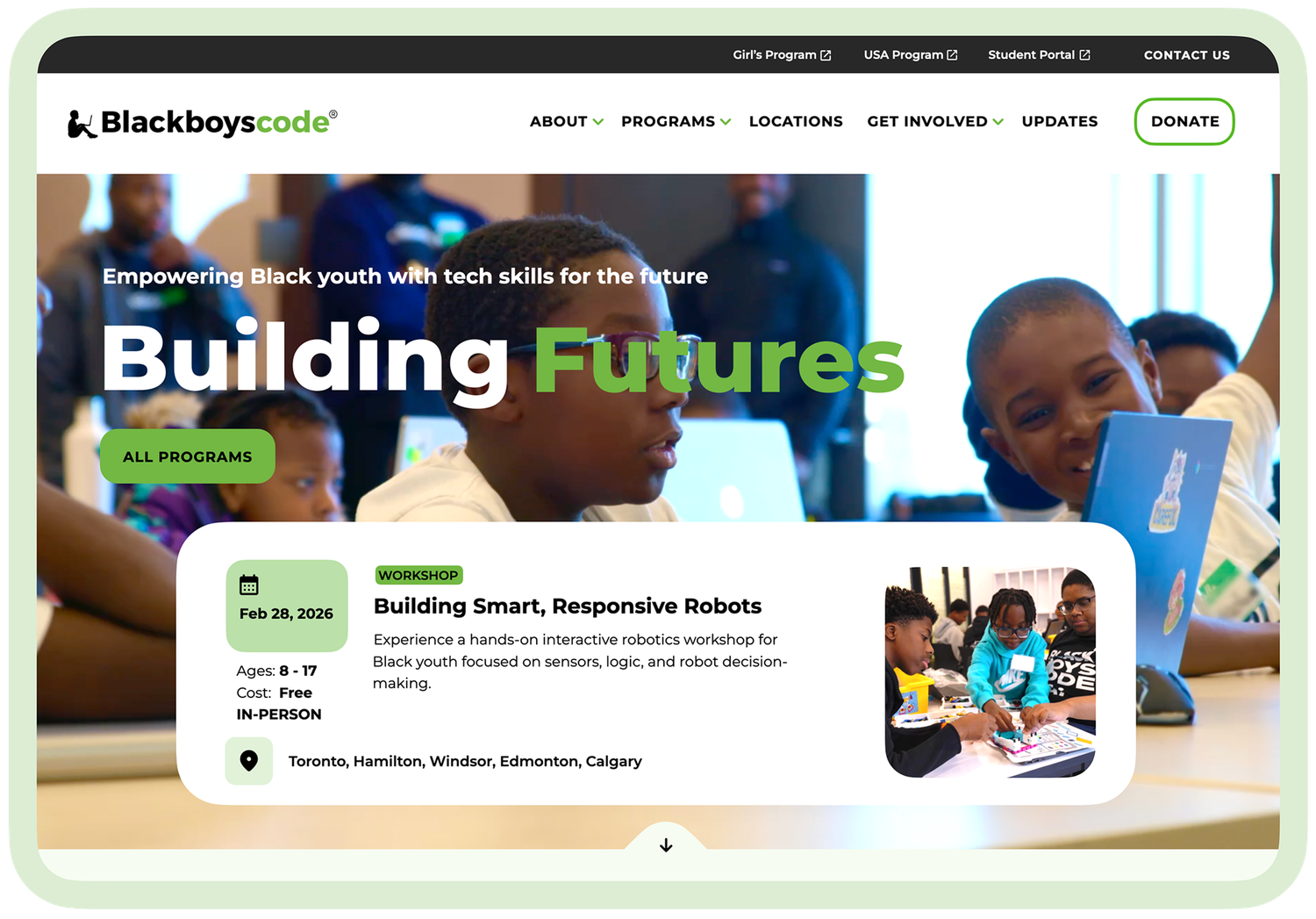 Black Boys Code homepage with the headline "Building Futures", an All Programs button and a featured robotics workshop card
